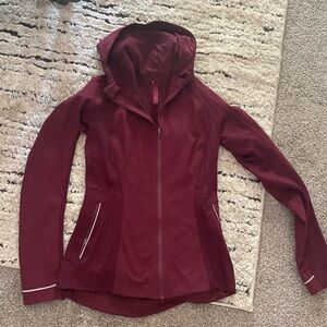 Lululemon used athletic, running jacket. Minor wear on inside, no holes.